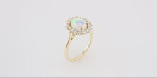 Load and play video in Gallery viewer, 14k Opal Cabochon Diamond Halo Cluster Ring
