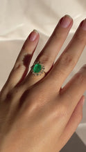Load and play video in Gallery viewer, Vintage 14k Colombian Emerald Diamond Halo Ring
