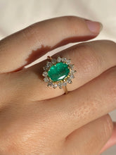Load image into Gallery viewer, Vintage 14k Colombian Emerald Diamond Halo Ring
